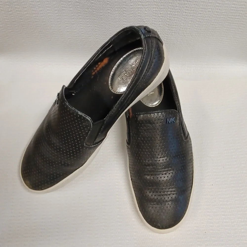Michael Kors slip-on perforated black leather S 5M great condition